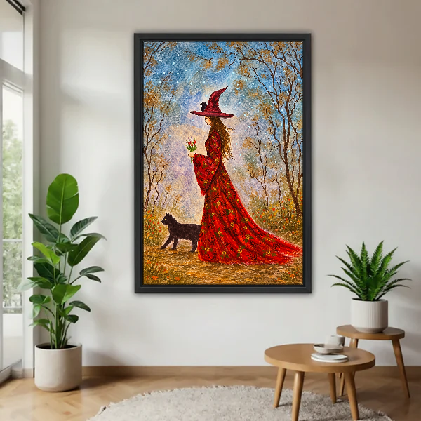 Woodland Witch Companion Canvas Wall Art framed above a pale wood table beside green plants.