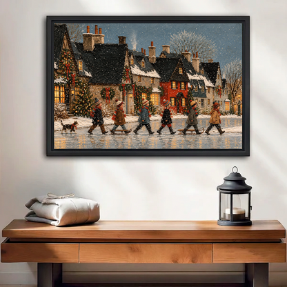 Christmas Village Crossing Canvas Wall Art framed above a wood console with lantern and folded linen.