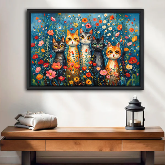 Cats Among Flowers Canvas Wall Art framed above a wood console with lantern and folded linen.