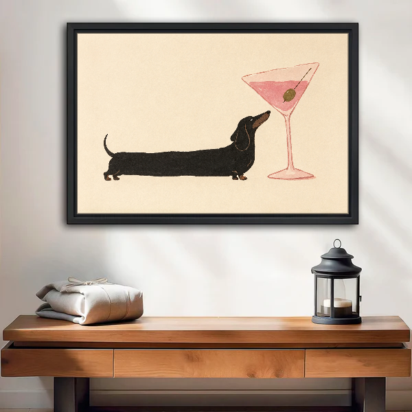 Dachshund Cocktail Pause Canvas Wall Art framed above a wood console with lantern and folded linen.