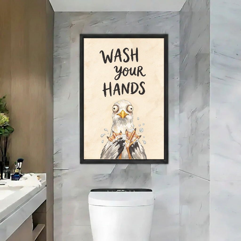 Wash Your Hands Gull Canvas Wall Art framed above a toilet against gray marble bathroom walls.