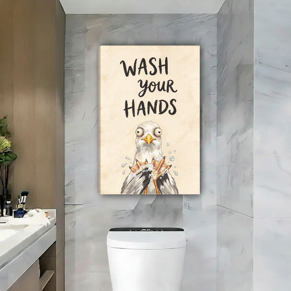 Wash Your Hands Gull Canvas Wall Art unframed above a toilet against gray marble bathroom walls.