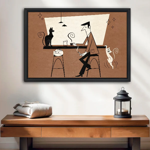 Cats At The Bar Canvas Wall Art framed above a wood console with lantern and folded linen.