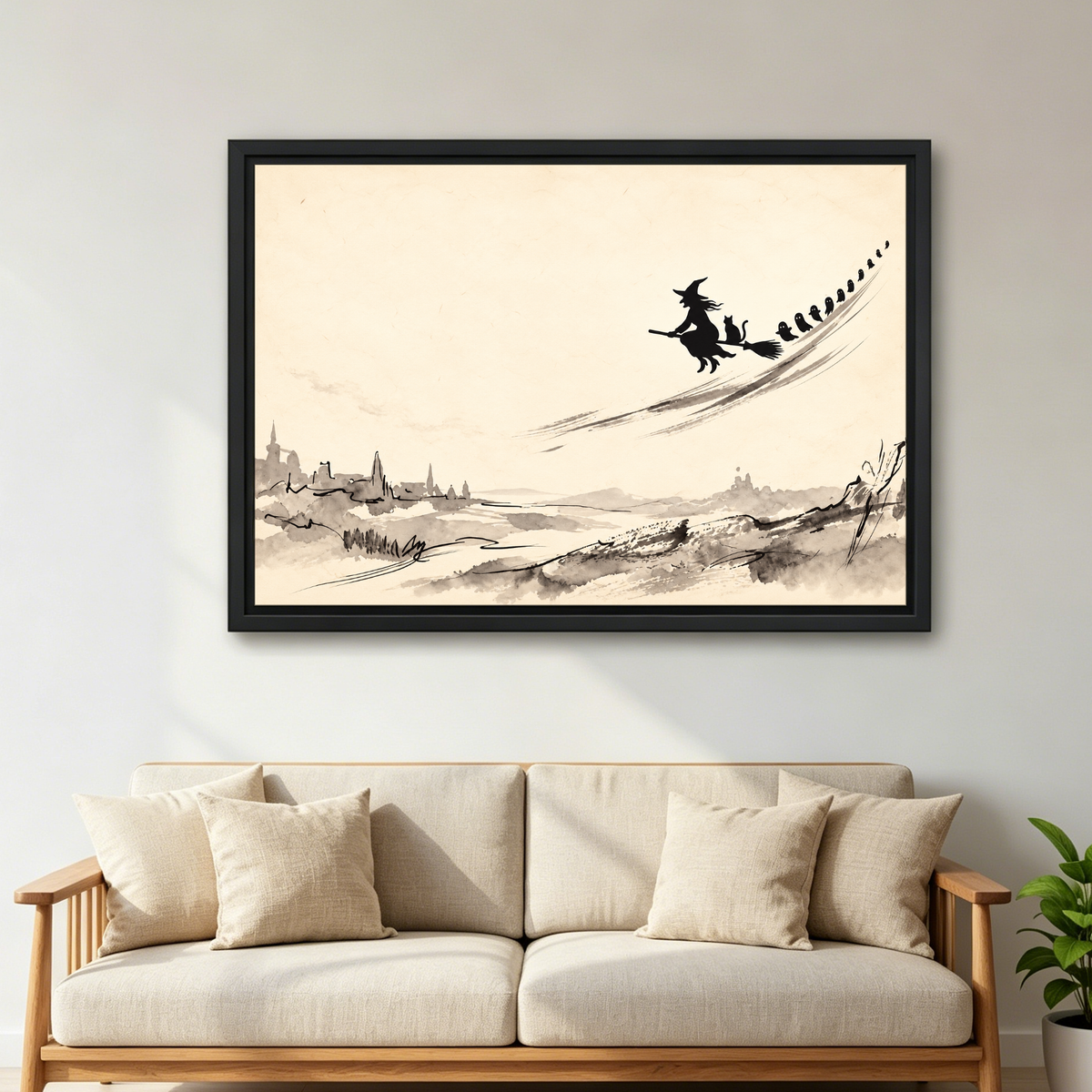 Witch Above Quiet Village Canvas Wall Art framed above a cream sofa with wooden arms.