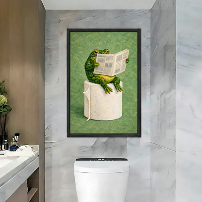 Frog Toilet Paper Reader Canvas Wall Art framed above a toilet against gray marble bathroom walls.