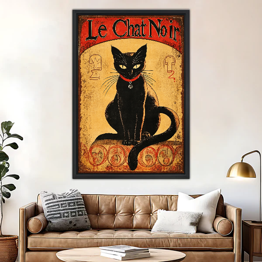 Le Chat Noir Portrait Canvas Wall Art framed above a brown leather sofa and brass lamp.