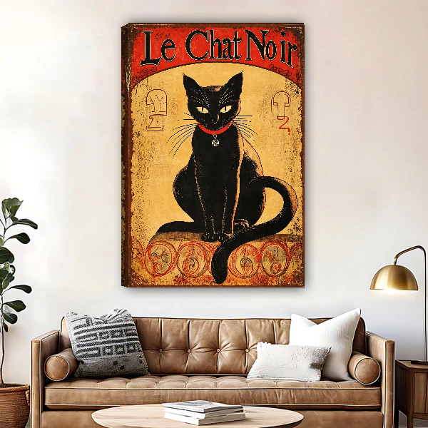 Le Chat Noir Portrait Canvas Wall Art unframed above a brown leather sofa and brass lamp.