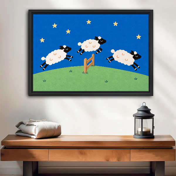 Three Leaping Night Sheep Canvas Wall Art framed above a wood console with lantern and folded linen.