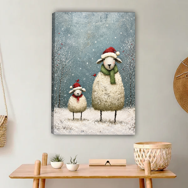 Cozy Christmas Sheep Pair Canvas Wall Art unframed above a light wood console and woven basket.