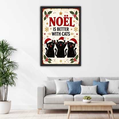Noel Better With Cats Canvas Wall Art framed above a pale gray sofa with blue cushions.