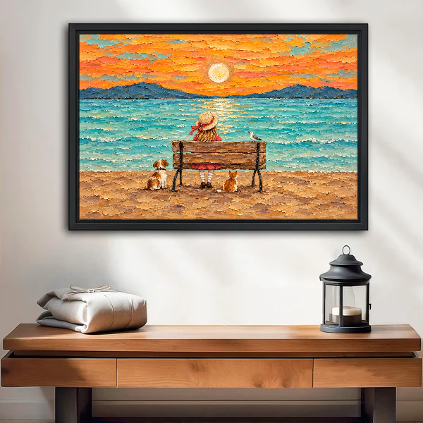 Seaside Sunset With Friends Canvas Wall Art framed above a wood console with lantern and folded linen.