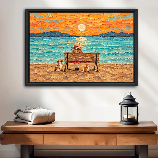 Seaside Sunset With Friends Canvas Wall Art framed above a wood console with lantern and folded linen.