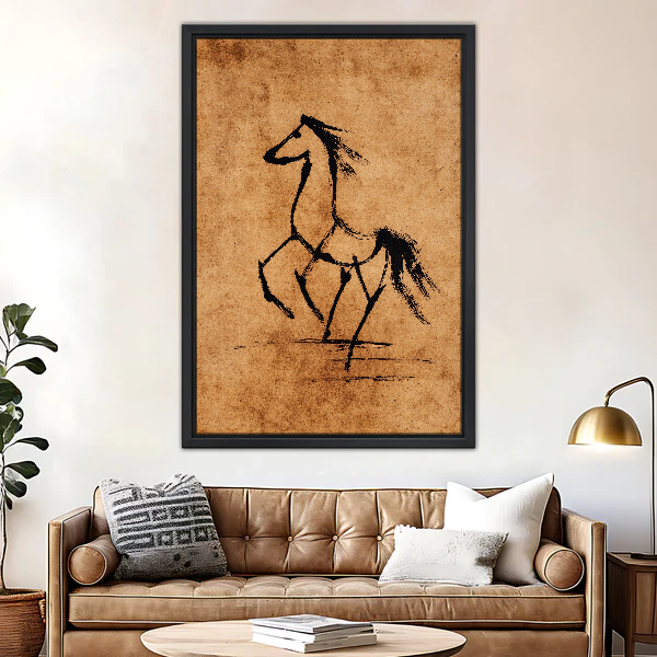 Prancing Ink Horse Canvas Wall Art framed above a brown leather sofa and brass lamp.
