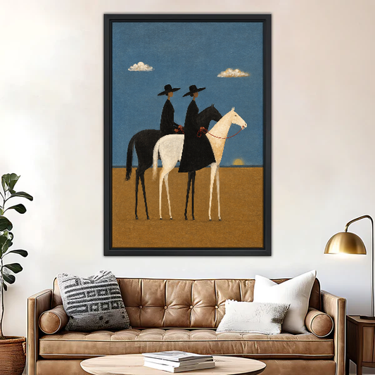 Two Riders Blue Sky Canvas Wall Art framed above a brown leather sofa and brass lamp.