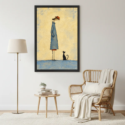 Little Cat Quiet Company Canvas Wall Art framed beside a wicker armchair and brass floor lamp.