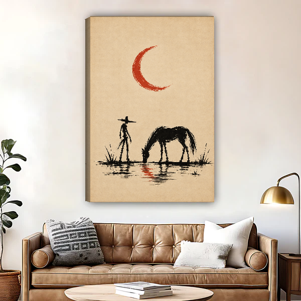 Cowboy Horse Red Moon Canvas Wall Art unframed above a brown leather sofa and brass lamp.