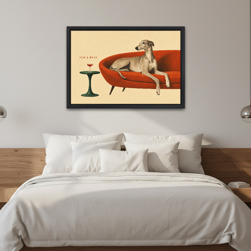 Greyhound Stay A While Canvas Wall Art framed above white bedding and wooden bedside tables.