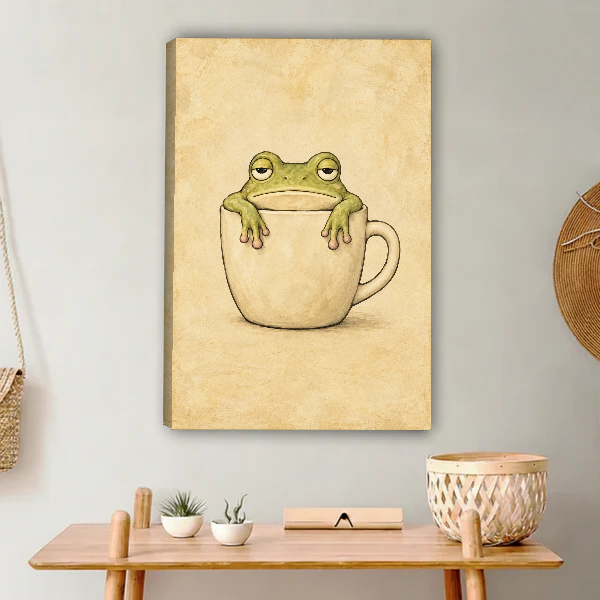 Sleepy Frog Cup Companion Canvas Wall Art unframed above a light wood console and woven basket.