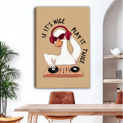Goose DJ Play It Twice Canvas Wall Art unframed above a wood desk beside a brown chair.