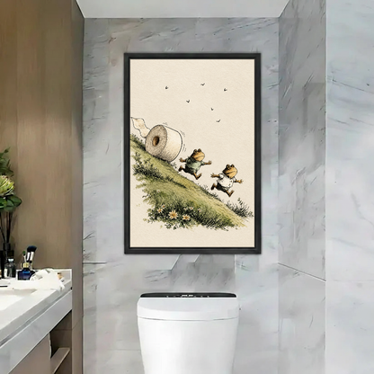 Runaway Toilet Roll Frogs Canvas Wall Art framed above a toilet against gray marble bathroom walls.