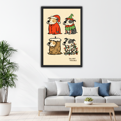 Holiday Trouble Costume Dogs Canvas Wall Art framed above a pale gray sofa with blue cushions.