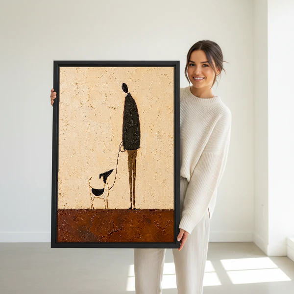 Little Dog Tall Companion Canvas Wall Art held in a black frame by a woman in cream.