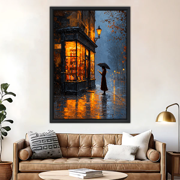 Rainy Evening Bookshop Canvas Wall Art framed above a brown leather sofa and brass lamp.
