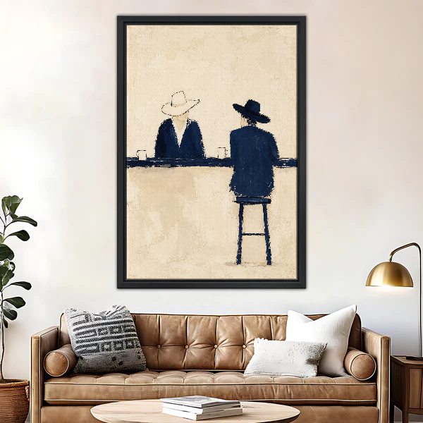 Quiet Cowboy Bar Conversation Canvas Wall Art framed above a brown leather sofa and brass lamp.