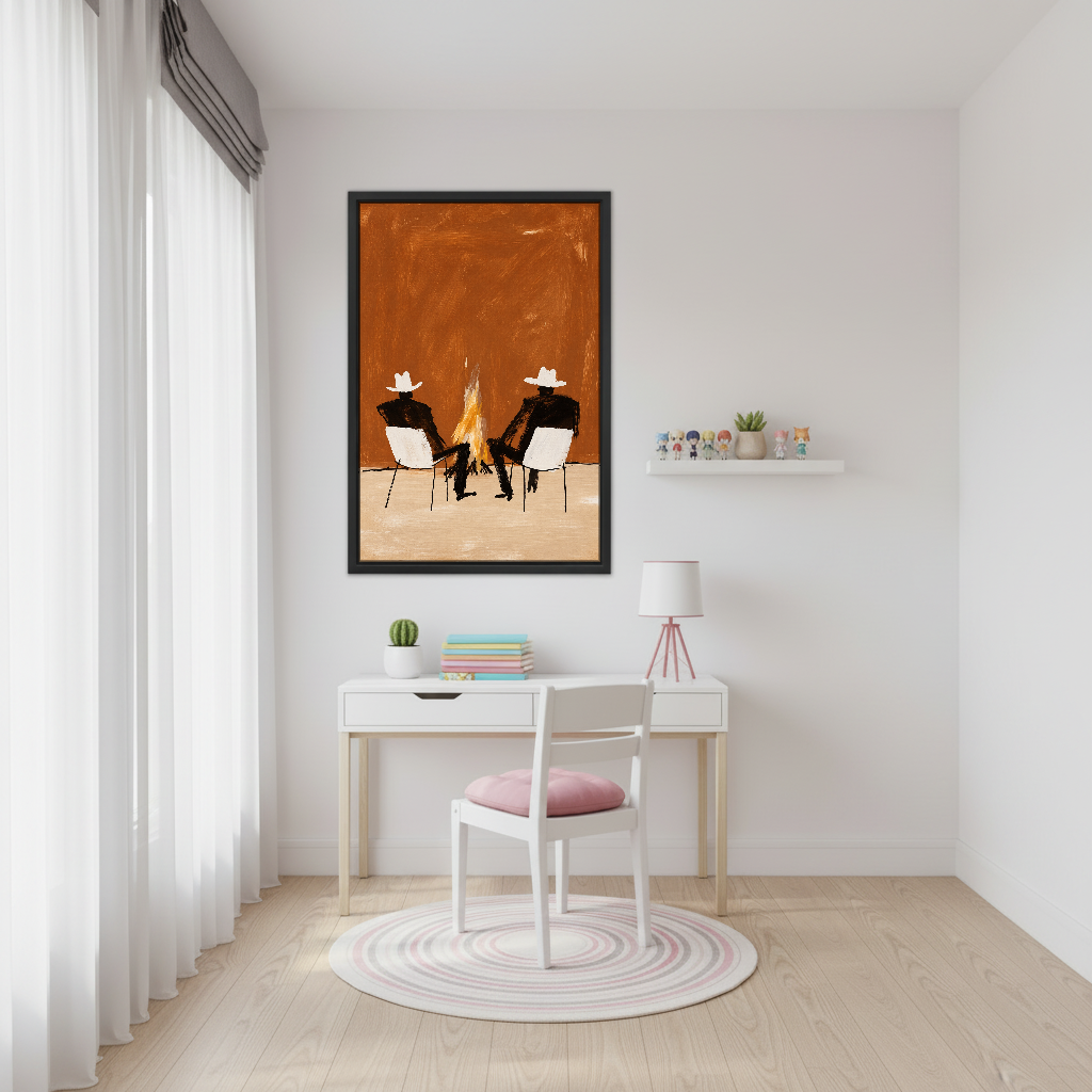 Cowboys By The Campfire Canvas Wall Art framed above a white desk beside a pale pink chair.