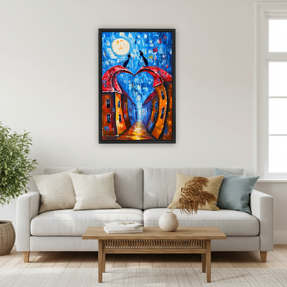 Moonlit Heart Rooftop Cats Canvas Wall Art framed above a cream sofa with blue cushions.
