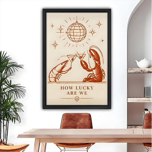 Black framed lobster and shrimp wall art displayed in an elegant dining room