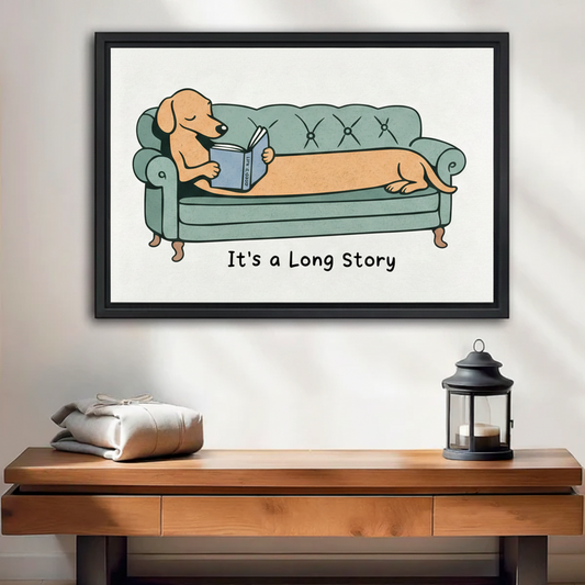 It's a Long Story wiener dog art print in black frame mounted on wall above entryway console table