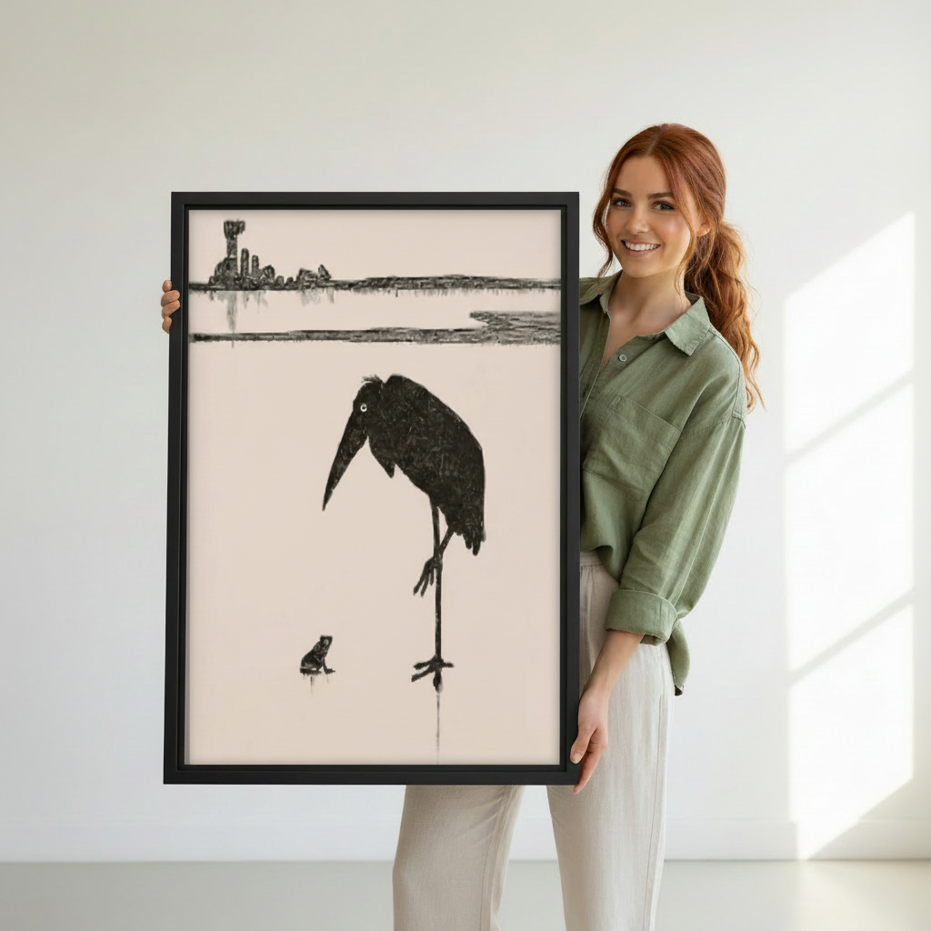 Woman holding minimalist bird and frog canvas wall art to show its framed scale and fine monochrome detail.