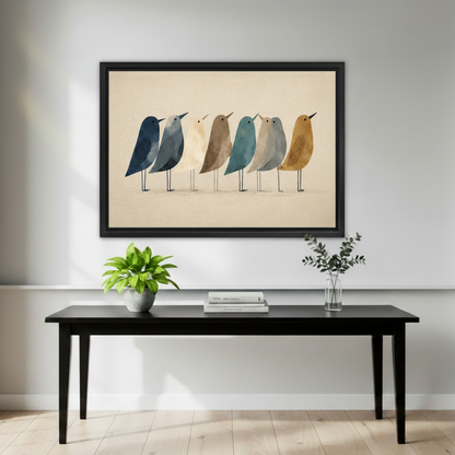 Minimalist bird art print in black frame above black console table in bright hallway entryway