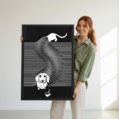 Smiling woman holding large black framed minimalist cat and dachshund canvas art print to show scale