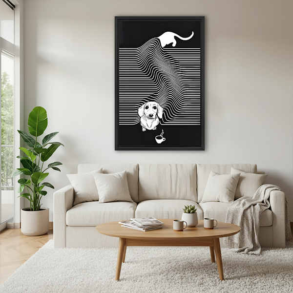 Black framed minimalist cat and dachshund canvas wall art hung above a cream sofa in a Scandinavian living room