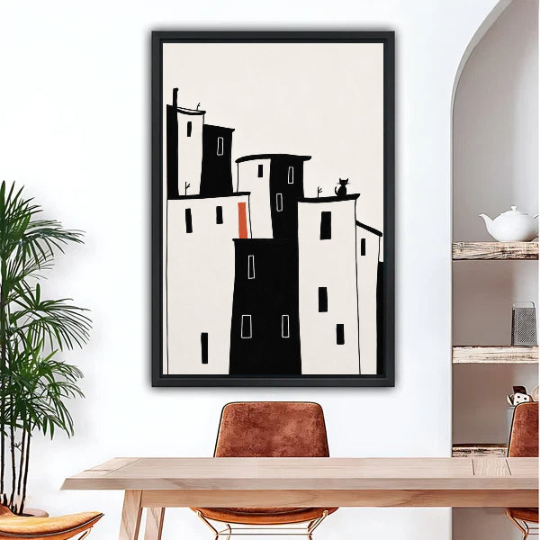 Minimalist city cat framed canvas wall art hung above dining table in modern white room