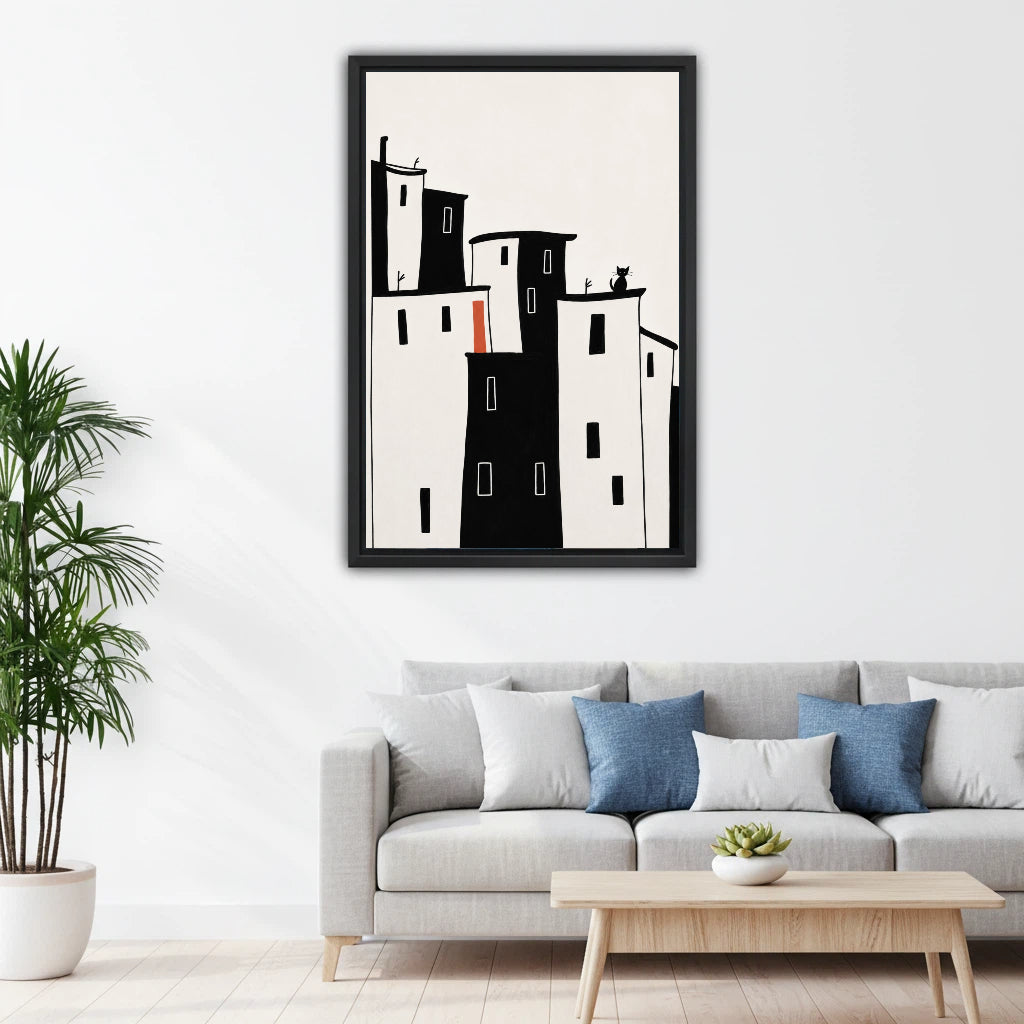 Minimalist black white city buildings canvas wall art above gray sofa in Scandinavian living room