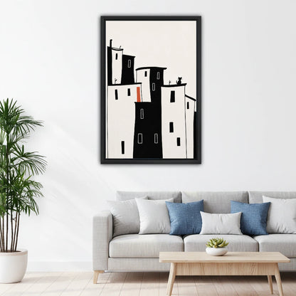 Minimalist black white city buildings canvas wall art above gray sofa in Scandinavian living room
