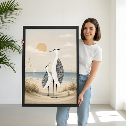 Woman holding large minimalist coastal heron pair black framed canvas print for size reference
