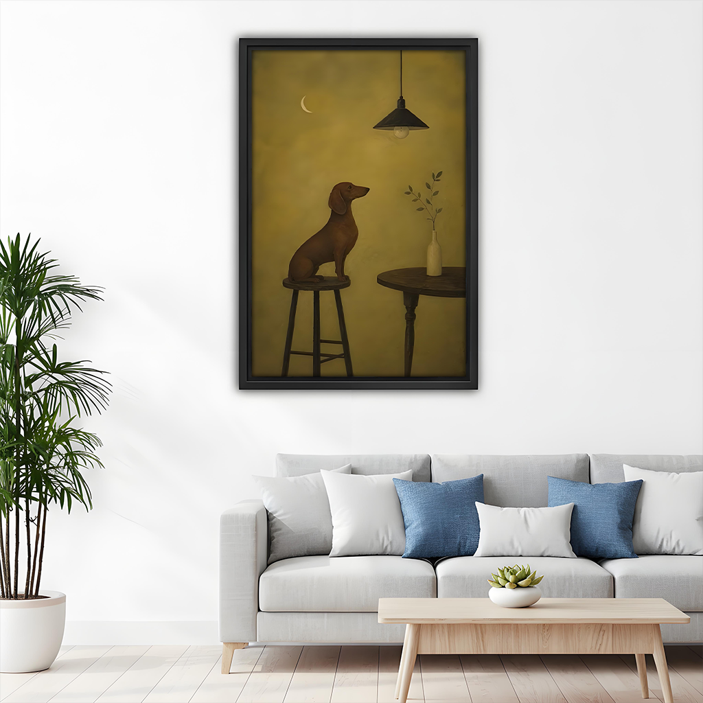 Framed minimalist dachshund canvas wall art above a gray sofa in a cozy living room.