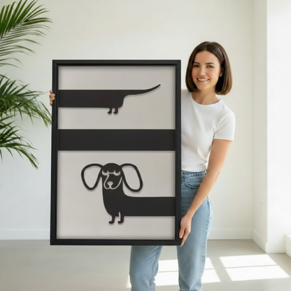 Woman holding large minimalist dachshund stripe framed canvas print, modern dog wall art size reference