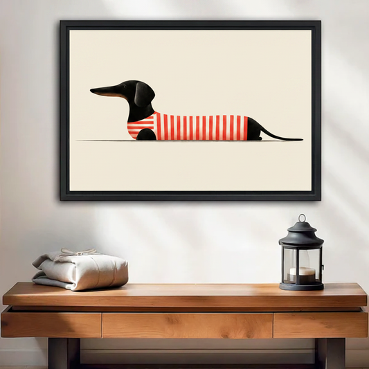 Minimalist dachshund in red striped sweater framed canvas wall art displayed above wooden console table