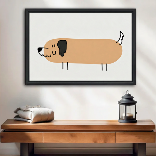 Cute minimalist dachshund line art black framed canvas above warm wooden console table with lantern and linen