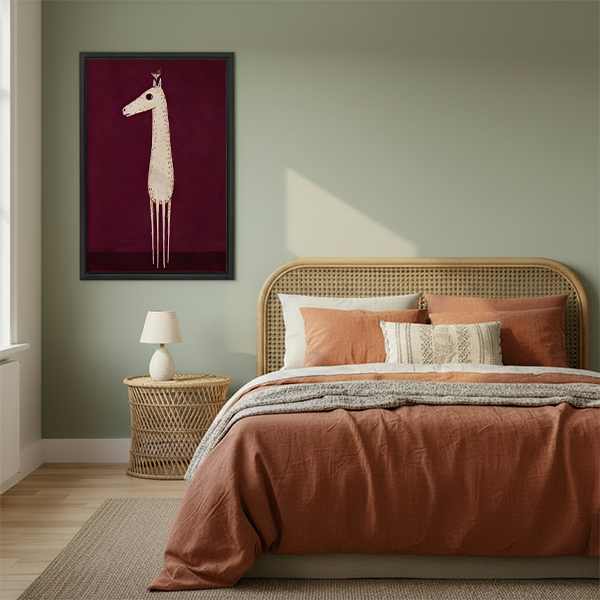Minimalist giraffe and bird framed canvas wall art above rattan bed in boho bedroom with sage green walls and terracotta bedding