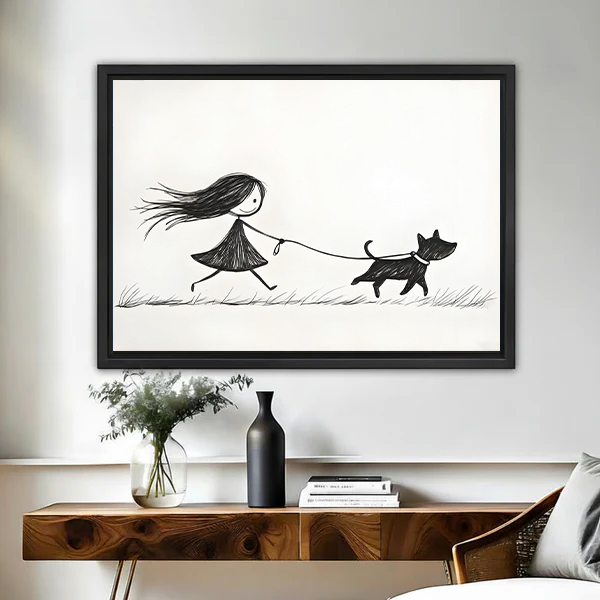 Minimalist black and white girl walking dog framed canvas wall art in black float frame above wooden console