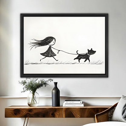 Minimalist black and white girl walking dog framed canvas wall art in black float frame above wooden console