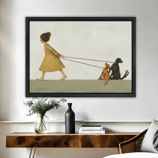 Minimalist girl in yellow dress walking two dogs framed canvas print hung above console in cozy bedroom
