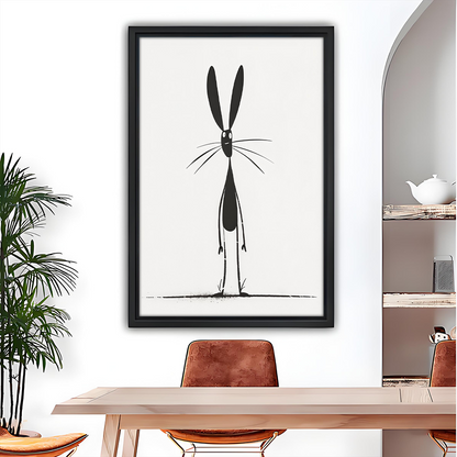 Minimalist rabbit canvas wall art in a black frame above a dining table with rust-colored chairs.