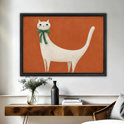 Minimalist white cat with green bow on terracotta background framed canvas print hung in cozy bedroom